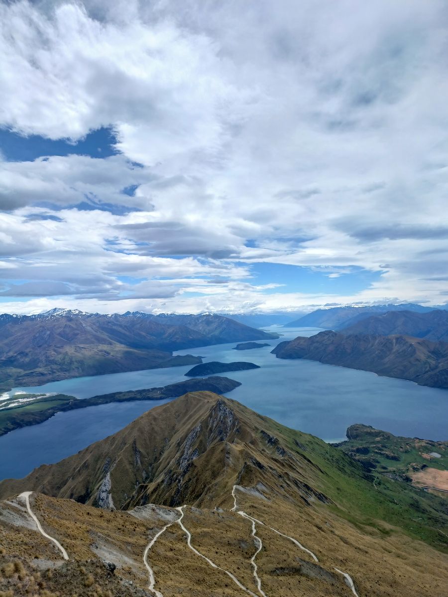 The zig-zag track below the ridge of Roys Peak, with Lake Wānaka and its islands